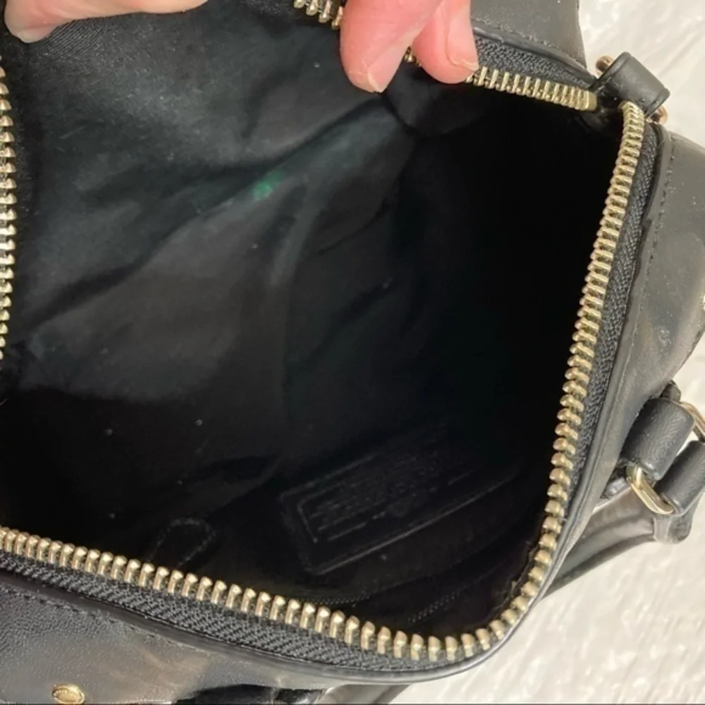 Coach gold embossed leather mini barrel bag